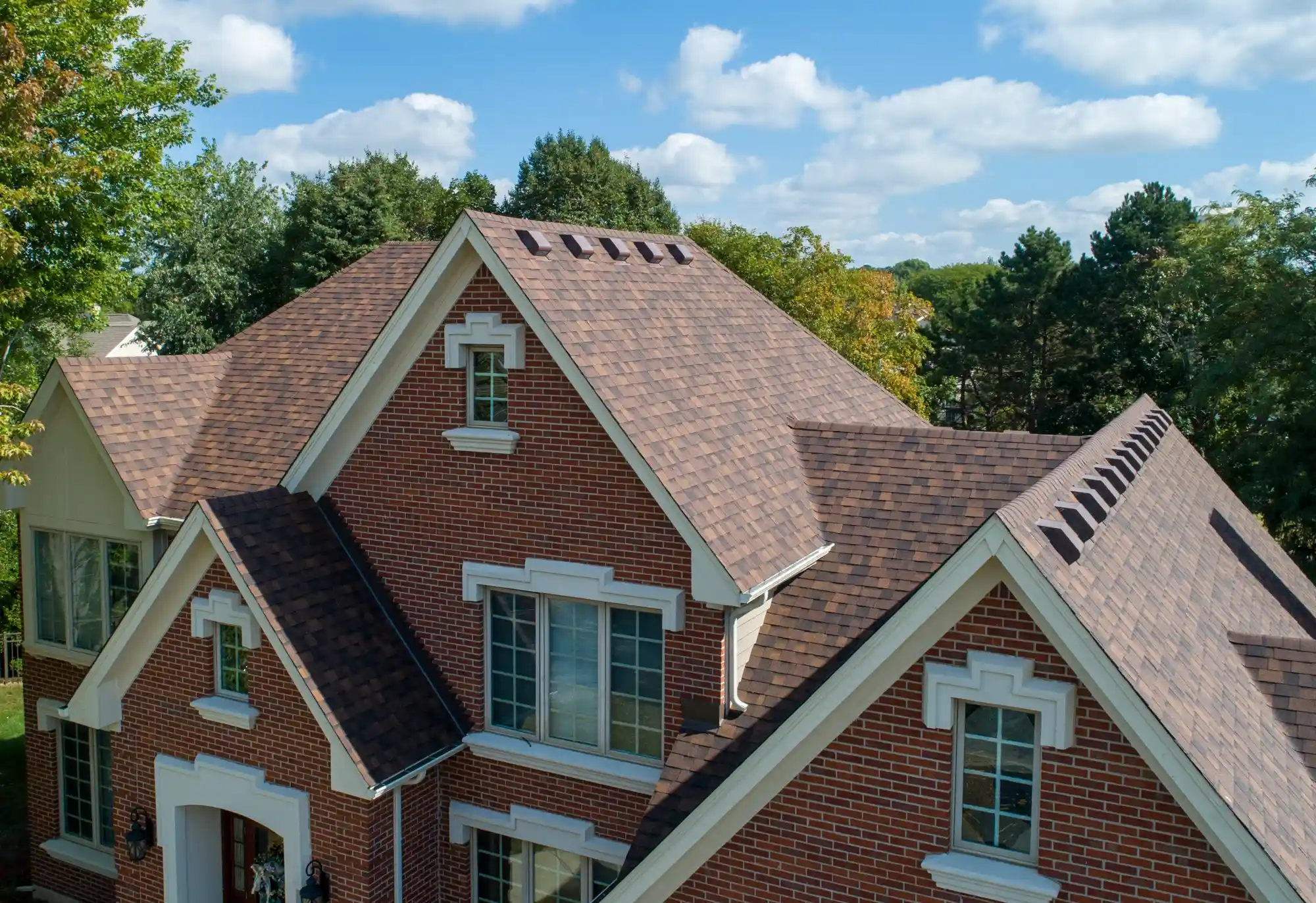 Residential roof and exterior detail from an Oakwood project.