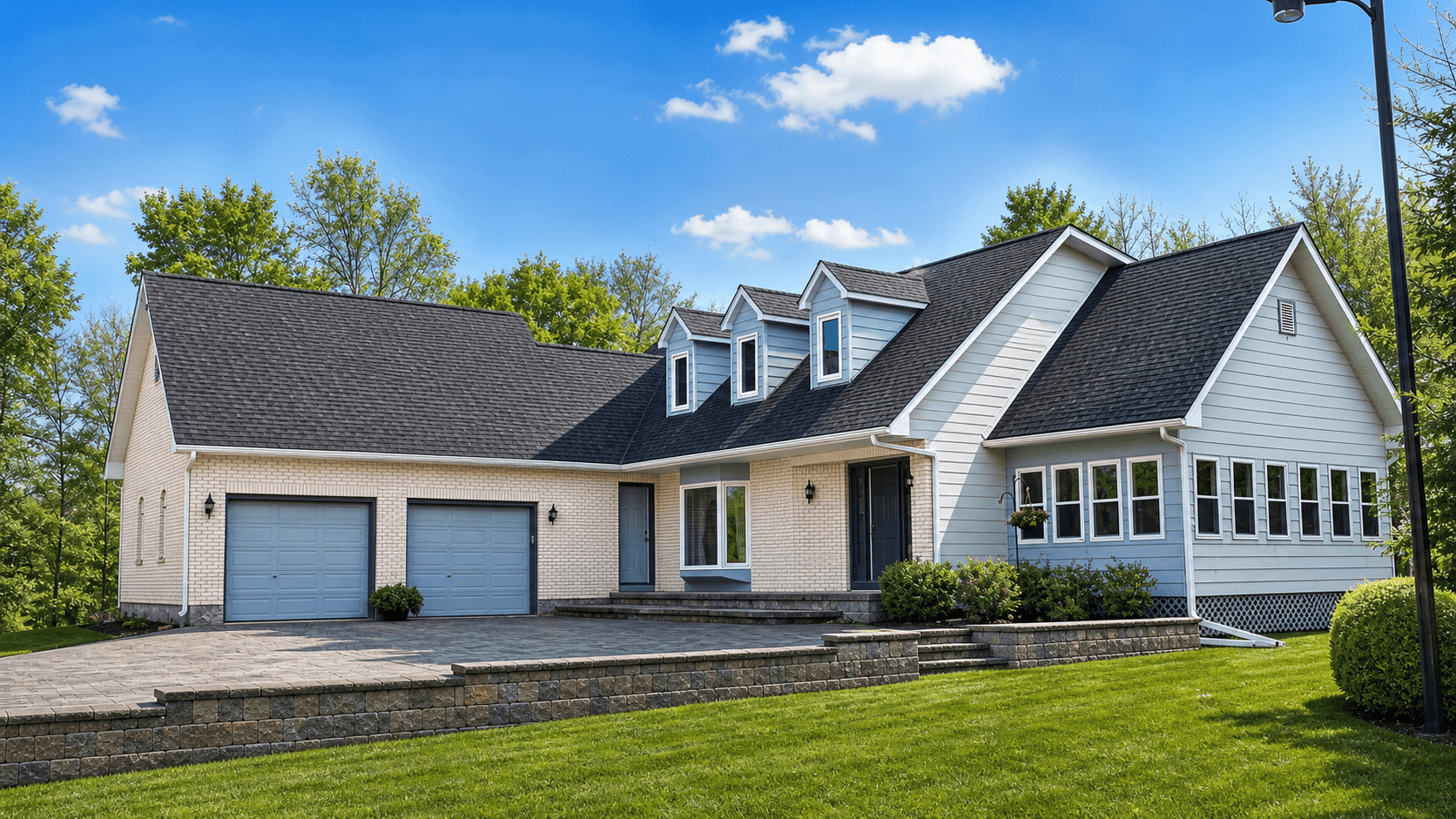 Finished Oakwood residential roofing project with a steep roofline.